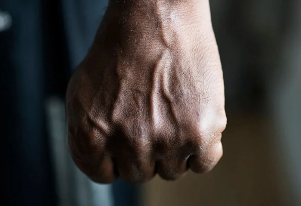 size4-15579102762721-124-closeup-black-hand-fist-53876-40987