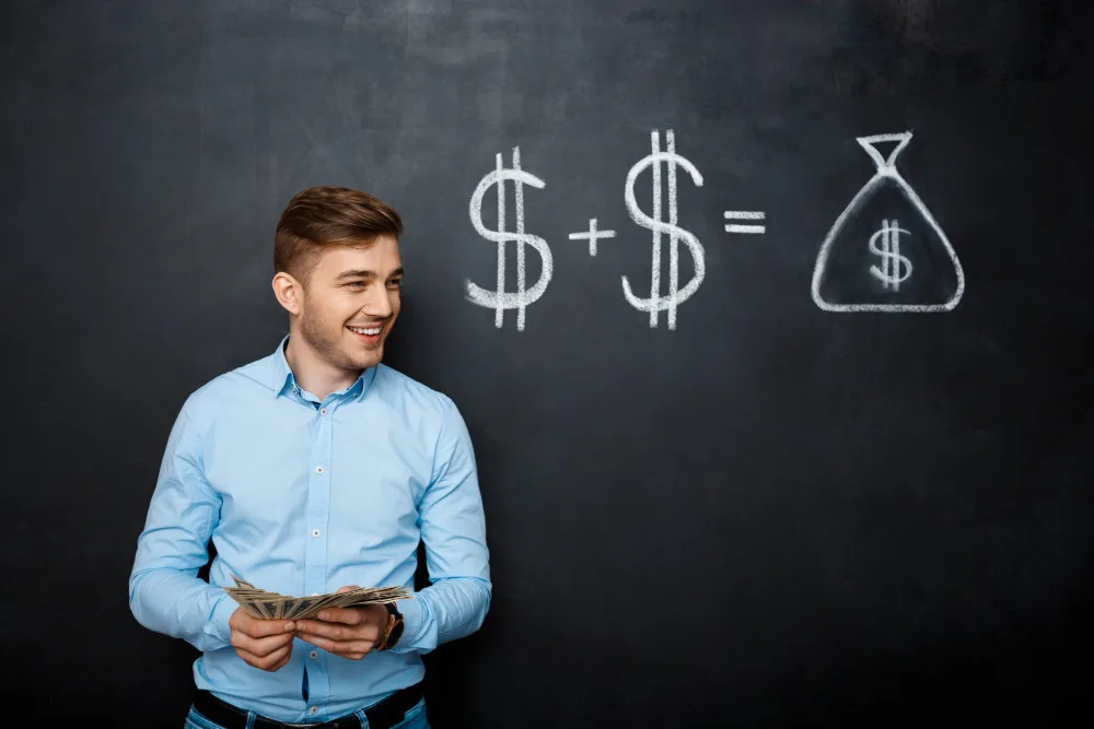 handsome-man-standing-blackboard-with-drawn-dollar-concept